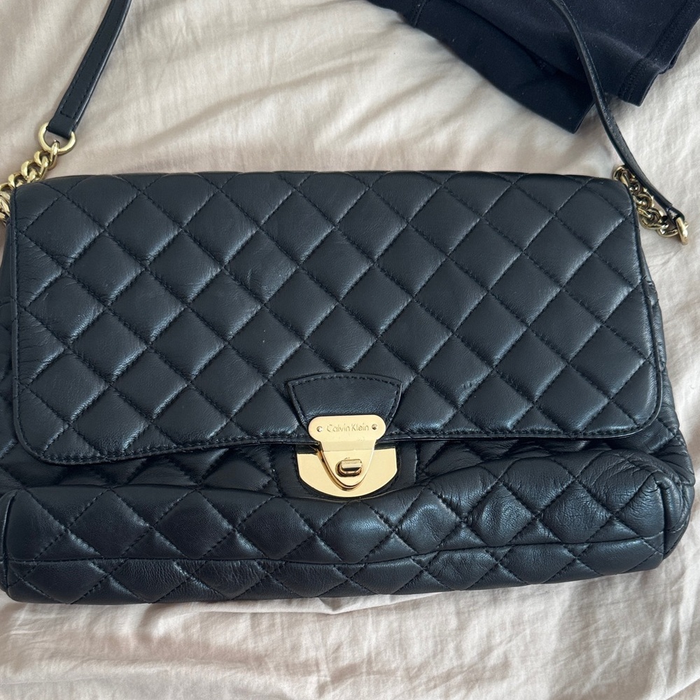 Calvin Klein Black Quilted Shoulder Bag with Gold Accents